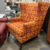 Red High Back Chair with Yellow Geometric Pattern