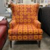 Red High Back Chair with Yellow Geometric Pattern