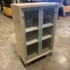 Sandy Brown Glass Front Opening Display Cabinet