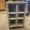 Sandy Brown Glass Front Opening Display Cabinet