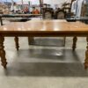 Simple Oak Toned Spun Pillar Legged Dining Table