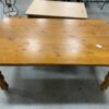 Simple Oak Toned Spun Pillar Legged Dining Table